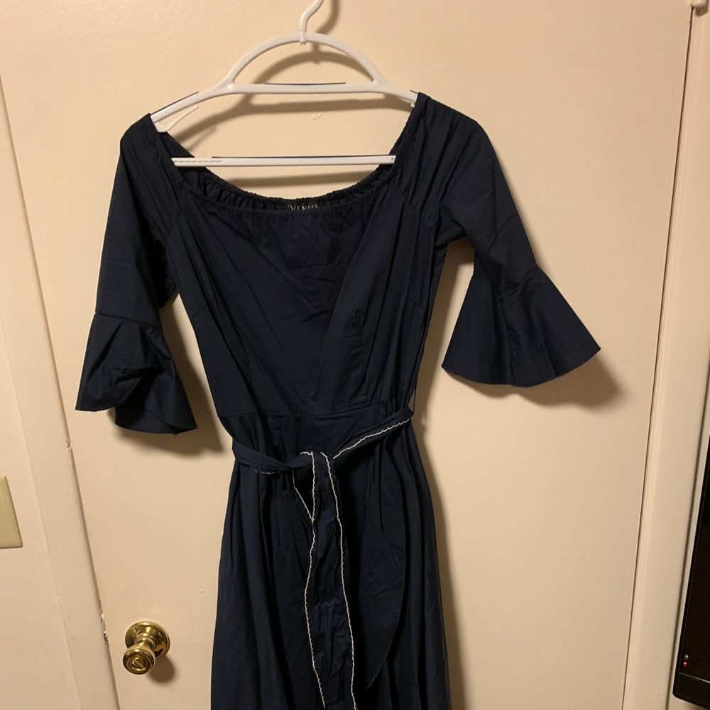 Only worn once to my son’s wedding. Navy
